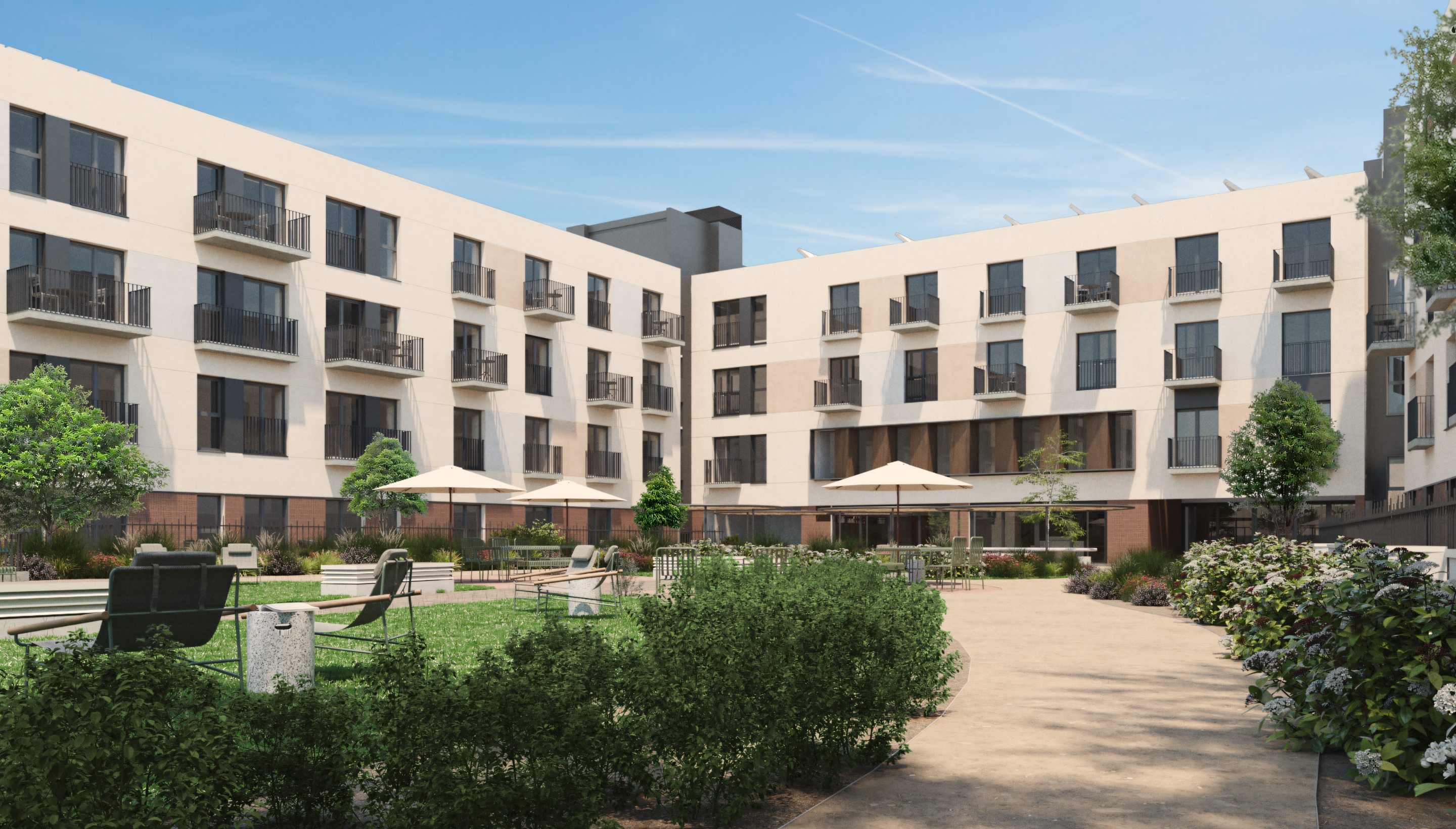 Jardín central al aire libre con áreas para sentarse y relajarse, rodeado de apartamentos en Calido Living.