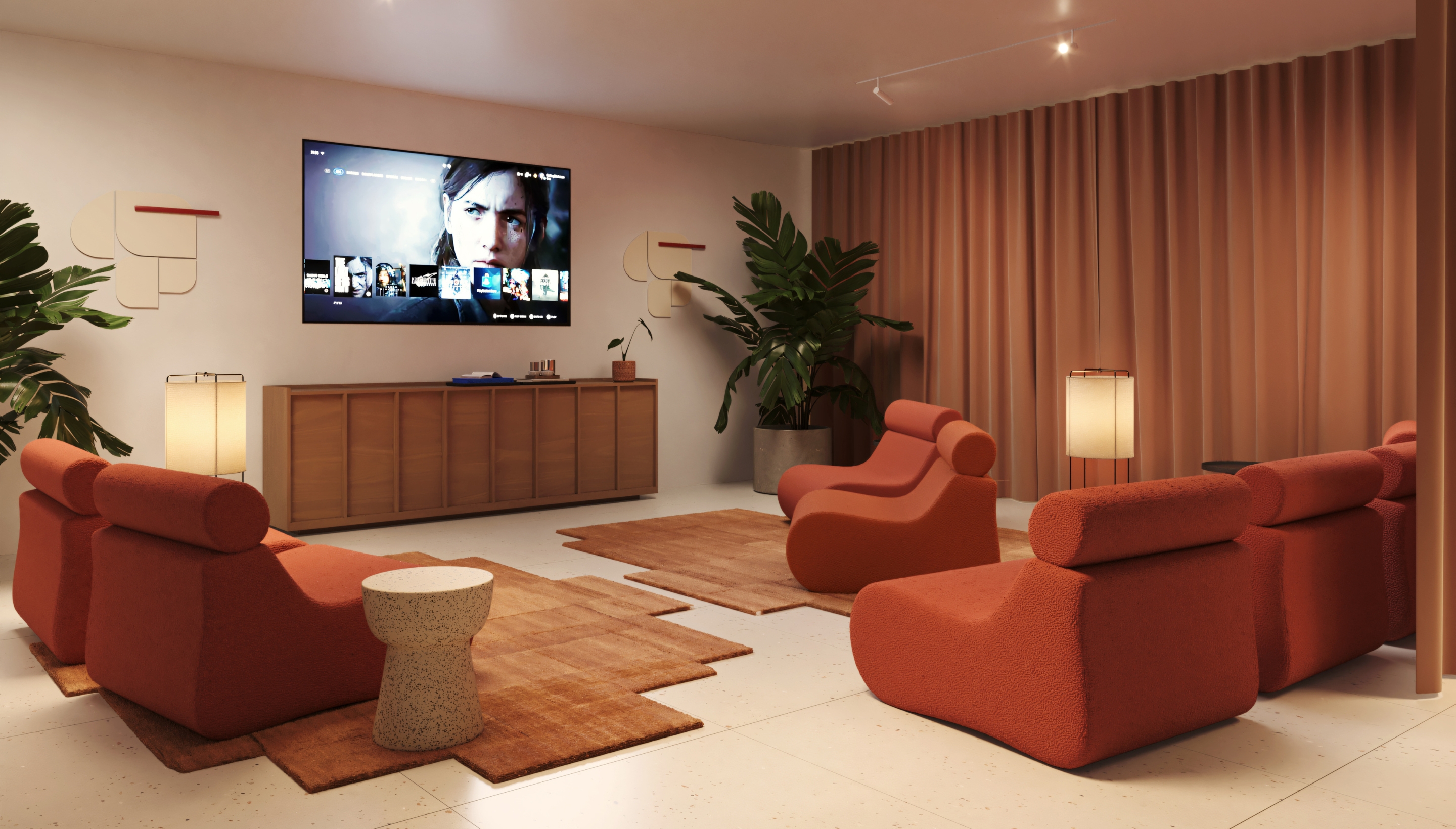 Área de proyección y entretenimiento con asientos cómodos y pantalla grande en Calido Living.