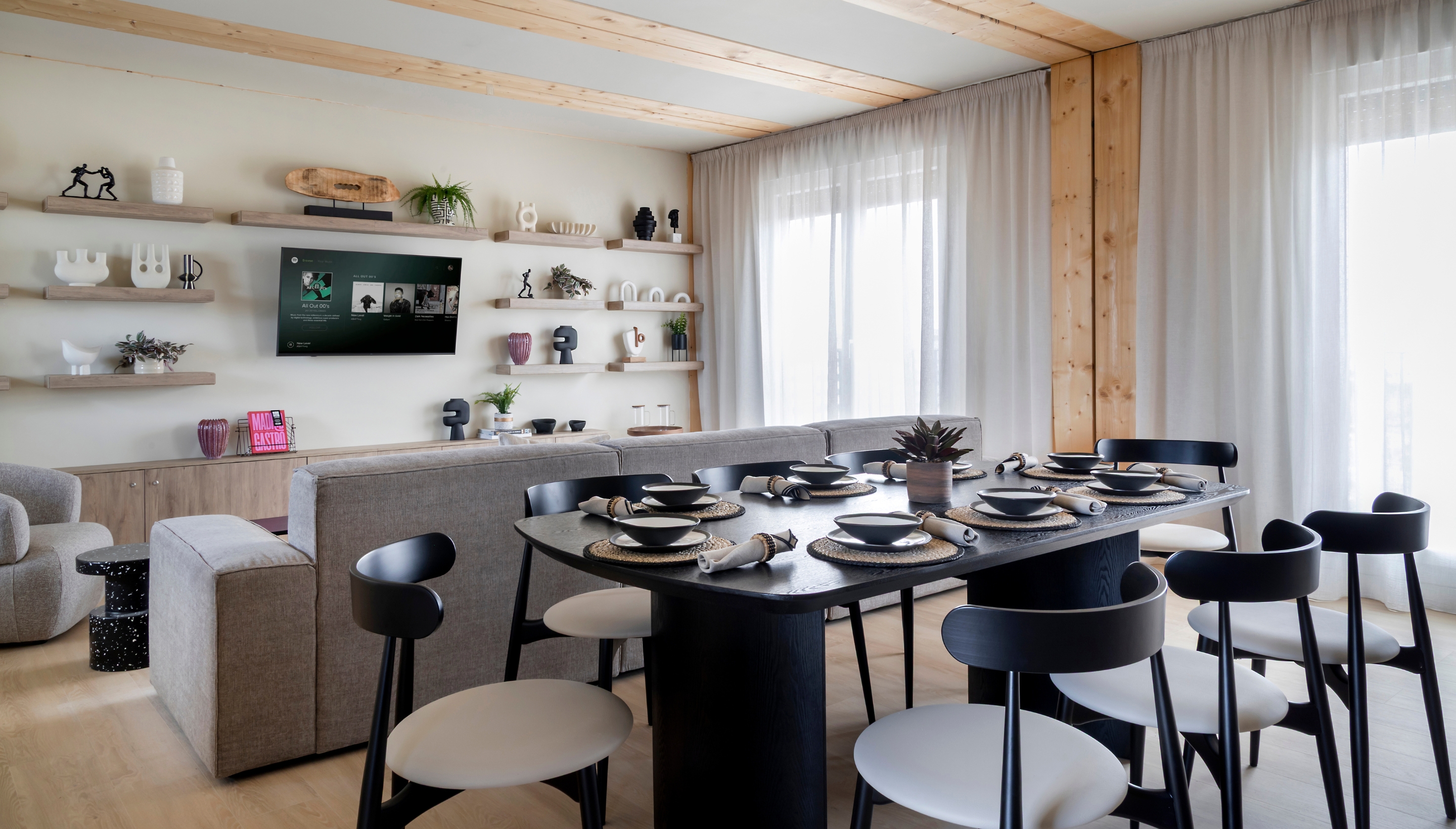 Cocina compartida moderna con comedor integrado y detalles minimalistas en Calido Living.
