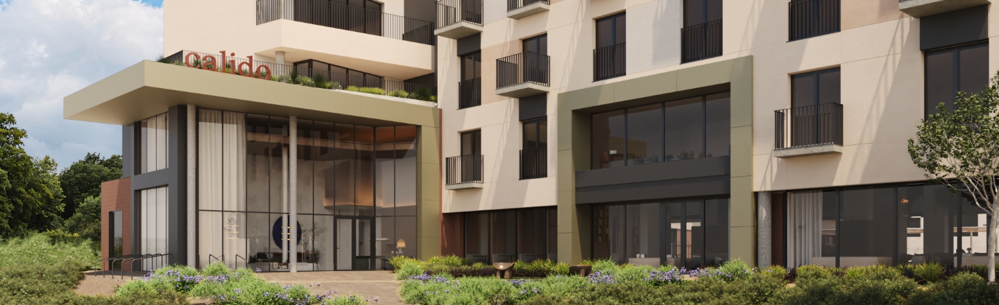 Fachada de Calido Living Alcobendas, moderno edificio residencial de Calido Living con balcones y zonas verdes en la entrada.